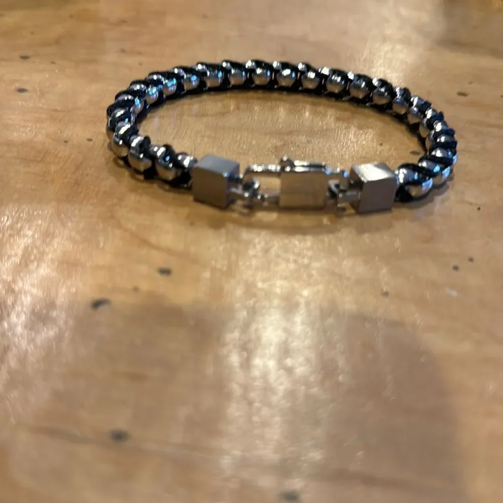 Nautica stainless steel brown cord cube and clasp closure bracelet. NWOT. In box